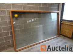 Wooden frame with pane in double glass + 3 double glazing glass standing against the wall